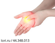 Wrist pain. Closeup of female arms holding his painful wrist caused by prolonged work on computer, laptop. Carpal tunnel syndrome, arthritis, neurological disease isolated on white background. Стоковое фото, фотограф Павел Муравьев / Фотобанк Лори