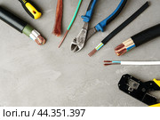 Electrical Tools and Wires on Gray Surface. Стоковое фото, фотограф Сергей Толмачёв / Фотобанк Лори