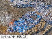 Top view of a huge dump of toxic and household waste. The problem of environmental pollution. Стоковое фото, фотограф Евгений Ткачёв / Фотобанк Лори
