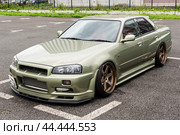 Ниссан Скайлайн GT-R R34 в Токио, Япония / Nissan Skyline GT-R R34 4 door (2017 год). Редакционное фото, фотограф Сергей Веселовский / Фотобанк Лори