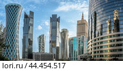 Doha, Qatar - February 4, 2023: View of city Doha, capital of Qatar. modern city, Middle East. West Bay Business quarter. Стоковое фото, фотограф Павел Муравьев / Фотобанк Лори