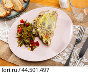 Fried piece of rib bone-in pork garnish with stewed beans and carrot. Стоковое фото, фотограф Яков Филимонов / Фотобанк Лори