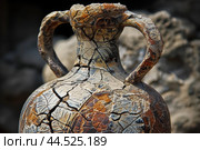 Ancient cracked clay amphora showing the inevitable passing of time. Стоковое AI-изображение, AI-художник Иван Рябоконь / Фотобанк Лори