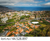Aerial drone view of Funchal town, Madeira, Portugal (2024 год). Стоковое фото, фотограф Дмитрий Рухленко / Фотобанк Лори