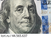 Benjamin Franklin's face on the US 100 dollar bill. Franklin on one hundred dollar bill. Detail of Portrait on One Hundred Dollar Bill. Стоковое фото, фотограф Павел Муравьев / Фотобанк Лори