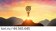 Successfully achieving your goal, Silhouette of businessman on mountain. Success Business Leadership, Winner on top. Concept of success. Стоковое фото, фотограф Павел Муравьев / Фотобанк Лори