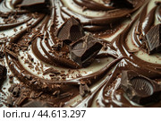 Decadent dark chocolate swirls with chunks. Стоковое AI-изображение, AI-художник Иван Рябоконь / Фотобанк Лори