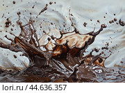 Dynamic splash in melted chocolate, capturing highspeed motion detail. Стоковое AI-изображение, AI-художник Иван Рябоконь / Фотобанк Лори