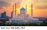 Hazrat sultan mosque shining during golden hour in astana, kazakhstan. Стоковое AI-изображение, AI-художник Юрий Поздников / Фотобанк Лори