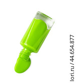 Bright colored nail polish bottles with drippings on white background. Стоковое фото, фотограф Сергей Толмачёв / Фотобанк Лори