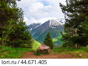 Beautiful view of the mountain nature against the background of the snowy peak of the Elbrus region in sunny weather. The highlanders of the North Caucasus. Russia. Стоковое фото, фотограф Константин Лабунский / Фотобанк Лори