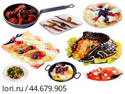 Set of many plates with tasty food over white background. Стоковое фото, фотограф Яков Филимонов / Фотобанк Лори