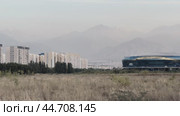 The Alma-Ata Rent sports complex and a new residential area against the backdrop of the Tien Shan spurs. Редакционное видео, видеограф Ярославский Максим / Фотобанк Лори