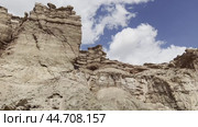 Panorama of the canyon cliffs in sunny weather against a blue sky background. Стоковое видео, видеограф Ярославский Максим / Фотобанк Лори