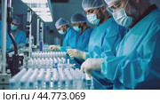 Scientists wearing protective gear developing new vaccine in modern laboratory. Стоковое AI-видео, аниматор Юрий Поздников / Фотобанк Лори