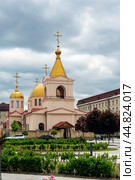 Grozny, Russia: 12.05.2024. Orthodox Church of St. Michael the Archangel in Grozny, Chechen Republic on Akhmad Kadyrov Avenue. Редакционное фото, фотограф Оксана Медведева / Фотобанк Лори
