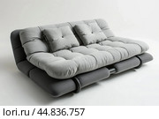 Modern grey futon sofa convertible couch isolated on white background. Стоковое AI-изображение, AI-художник Иван Рябоконь / Фотобанк Лори
