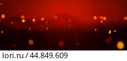 Fire bokeh overlay. Fiery orange glowing flying away particles. Burning hot sparks, embers burning cinder. Realistic heat effect with glow and sparks from bonfire. Стоковое фото, фотограф Павел Муравьев / Фотобанк Лори