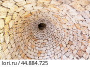 Typical conical stone roof of a house - trullo in Alberobello, Puglia, Italy. View from the bottom up, indoors. (2019 год). Стоковое фото, фотограф Лариса Гордеева / Фотобанк Лори