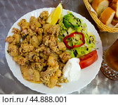 Chipirones battered fried baby squid. Стоковое фото, фотограф Яков Филимонов / Фотобанк Лори