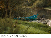 The Golden Ring of Russia, the city of Pereslavl-Zalessky. Fishing boats on the Trubezh River at dawn. Стоковое фото, фотограф Photojuli / Фотобанк Лори