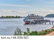Cruise ship Alexander Fadeev at pier. Kama River, near town of Yelabuga, Russia (2024 год). Редакционное фото, фотограф Ирина Кононова / Фотобанк Лори