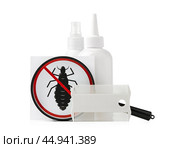 Cosmetic products and lice comb isolated on white background. Стоковое фото, фотограф Сергей Толмачёв / Фотобанк Лори
