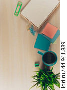 Top view workspace with blank notebook and pen on wooden table. Стоковое фото, фотограф Сергей Толмачёв / Фотобанк Лори