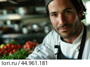 An attractive male chef, showcasing his culinary mastery and charisma. Редакционное AI-изображение, AI-художник Veniamin Kraskov / Фотобанк Лори