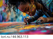 A woman artist creating a vibrant mural that pays homage to African culture and history. Стоковое AI-изображение, AI-художник Veniamin Kraskov / Фотобанк Лори