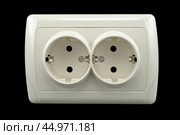 Электрические розетки на черном фоне. Electrical socket on an isolated black background. Стоковое фото, фотограф Татьяна Д / Фотобанк Лори