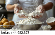 Baker sifts flour in a kitchen with fresh eggs on the counter in the morning light. Стоковое AI-изображение, AI-художник Юлия Гапеенко / Фотобанк Лори