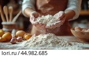 Baker sifts flour in a kitchen with fresh eggs on the counter in the morning light. Стоковое AI-изображение, AI-художник Юлия Гапеенко / Фотобанк Лори