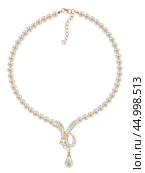Pearl beads with gold pendant with inserts of gems. Редакционное фото, фотограф Татьяна Грачева / Фотобанк Лори