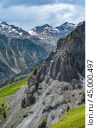 Mountains landscape. snow-capped peaks. Idyllic mountain background. Panoramic view of beautiful mountain landscape. Стоковое фото, фотограф Павел Муравьев / Фотобанк Лори