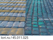 Colorful pavement on the Moscow street. Pedestrian crosswalk in the sunset. (2019 год). Стоковое фото, фотограф YuryKara / Фотобанк Лори