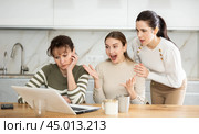 Women are sitting at computer and are immensely happy. Стоковое фото, фотограф Яков Филимонов / Фотобанк Лори
