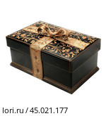 Elegant black lacquered gift box with golden ribbon for luxury gift giving. Стоковое AI-изображение, AI-художник Иван Рябоконь / Фотобанк Лори