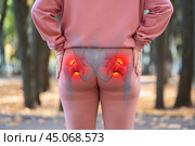Hip dysplasia, joint inflammation, woman suffering from pain after workout, pelvic osteoarthritis. Стоковое фото, фотограф Станислав Тарко / Фотобанк Лори