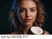 A beautiful woman holds half a coconut, symbolizing tropical freshness, natural beauty, and a healthy, vibrant lifestyle in a tropical setting. Стоковое AI-изображение, AI-художник Ольга Игнашина / Фотобанк Лори