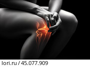 Knee pain, joint inflammation, bone fracture, woman suffering from osteoarthritis, leg injury, arthritis and degenerative changes, black background. Стоковое AI-изображение, AI-художник Станислав Тарко / Фотобанк Лори