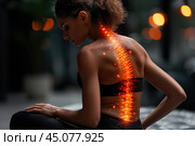 Neck and lumbar pain, intervertebral spine hernia, African black woman with back pain at home, spinal disc disease, health problems concept. Стоковое AI-изображение, AI-художник Станислав Тарко / Фотобанк Лори