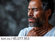 Thyroid gland inflammation, man with neck pain, sore throat and cough. Стоковое AI-изображение, AI-художник Станислав Тарко / Фотобанк Лори