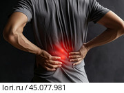 Lumbar intervertebral spine hernia, back pain, kidney stones, inflammation and disease, man suffering from backache at home. Стоковое AI-изображение, AI-художник Станислав Тарко / Фотобанк Лори