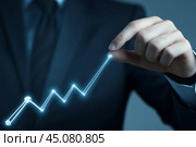 Increased profits. Benchmarking. Businessman analyzes profitability of working companies with digital augmented reality graphics, positive indicators, growing up graph and charts, colorful arrows. Стоковое AI-изображение, AI-художник Марина Демидюк / Фотобанк Лори