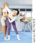 Woman and girl in gym perform basic elements of krav maga self-defense system. Стоковое фото, фотограф Яков Филимонов / Фотобанк Лори