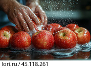 Человек моет красные спелые яблоки под струей воды. Стоковое AI-изображение, AI-художник Щеголева Ольга / Фотобанк Лори