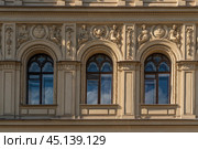 View of the exterior stucco decoration of the apartment house of the merchant Ritz-A-Porto (formerly owned by Marquis Alexander Paullucci) on the Moika River embankment, St. Petersburg, Russia. Стоковое фото, фотограф Ula Ulachka / Фотобанк Лори