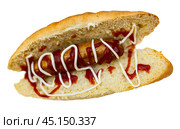 Appetizing bocadillo sandwich from fresh bun with roasted bratwurst sausage topped. Стоковое фото, фотограф Яков Филимонов / Фотобанк Лори