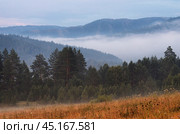 Туманный летний закат на Южном Урале. A misty summer sunset in the Southern Urals. Стоковое фото, фотограф Евгений Романов / Фотобанк Лори